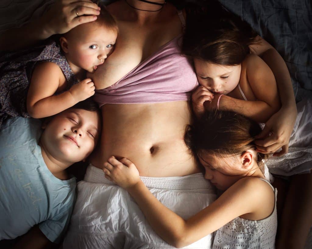postpartum mom of four breastfeeding