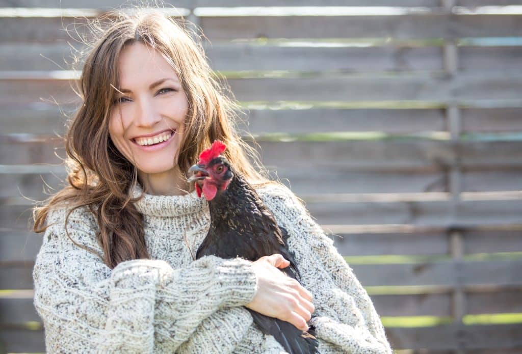 woman and chicken